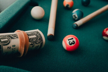 Gambling addiction.Money dollars on the game of snooker, sports betting, dollars.gambling addiction...
