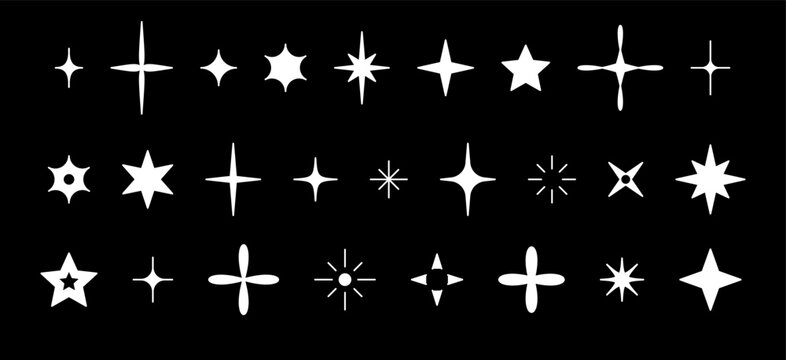 Set with white silhouettes glitter, stars and sequins. Doodle glitter isolated on black background.