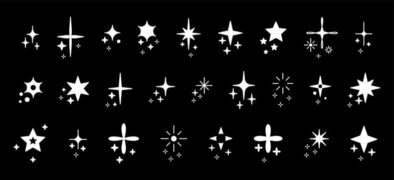 Set with glitter, stars and sequins. Doodle composition with white silhouettes glitter isolated on black background.