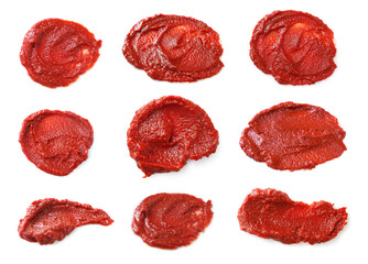 Tomato paste smears on white background, set