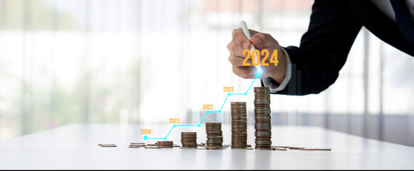Growth coin stack symbolizing business investment and economic growth. Business people doing financial planning to achieve financial goal and contribute maximum profit on new year 2024 . Shrewd - obrazy, fototapety, plakaty