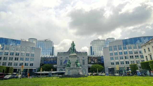 The Place du Luxembourg, Luxembourg Square in the European Quarter of Brussels Belgium Place Lux or Plux. Monument to John Cockerill flanked by the European Parliament
