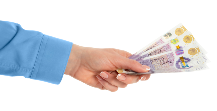 Female hand holding British pounds currency isolated on white background