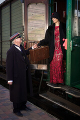 Flapper dress lady getting off the train