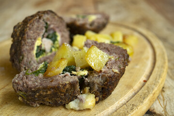 stuffed meatloaf and baked potatoes