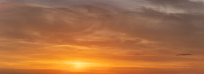 Wide-format, red sunset or sunrise, sky with a multitude of vibrant color shades.
