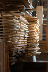 Stacks of cut wood at the woodworker workshop - 693479378