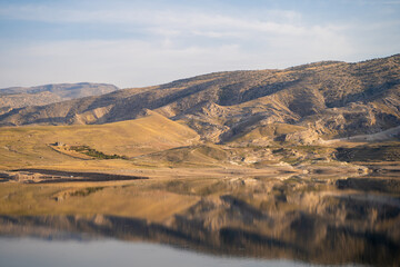 View of the Tigris River. Reflection of the mountains in the river.