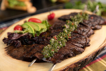 Close up of grilled steak with chimuchurri