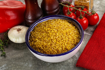 Dry wheat bulgur cereal heap