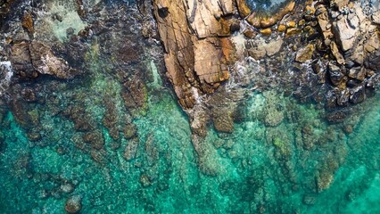 Aerial view of an emerald green sea and big foaming waves. Indian Ocean. Dikwella beach. Sri Lanka. High quality photo