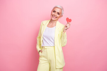 Photo of business lady promoting valentine day heart postcard buy subscription on dating service...