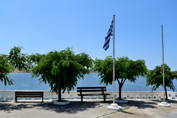 Sea view and the Greek flag proudly raised - Agios Haralambos, Lemnos island, Greece, Aegean Sea