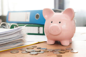 Savings money with piggy bank concept