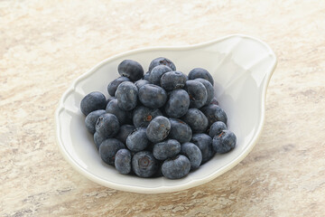 Sweet ripe blueberry heap in the bowl