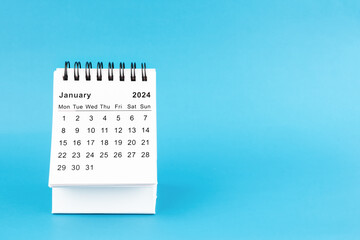 January 2024 desk calendar isolated in blue background.