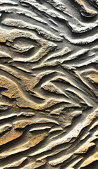 muro de cemento piedra roca duro dureza textura patr&oacute;n rectangular geom&eacute;trico gris grises filas trazos l&iacute;neas revoque mezcla onda ondulado Estructura antiguo viejo fosil fosilizado