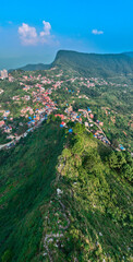 Aerial view of Bandipur from Thani mai temple hill. Nepal. Main street with shops and commercial...