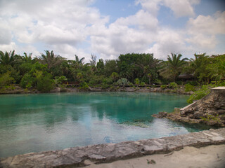 natural pool with turquoise water in chankanaab beach adventure park in san miguel de cozumel,...