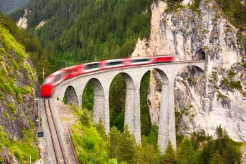 Wallpaper murals Landwasser Viaduct Swiss red train on viaduct in mountain, scenic ride