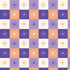 A pattern with multicolored daisy 
 flowers in squares