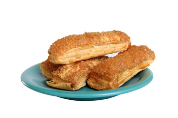 Breadsticks with sugar on white background.