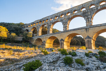 The magnificent Pont du Gard, at setting sun., ancient Roman aqueduct bridge. Photography taken in Provence, southern France