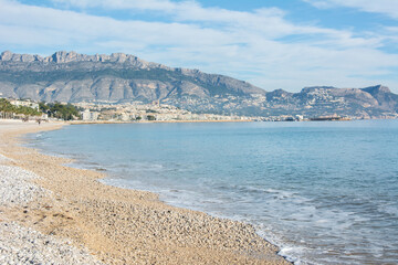 View over the L'Albir Beach and Altea Beach with Bernia Mountains at the back from the walk path in Serra Gelada Nature Park in Alfaz del Pi on Costa Blanca