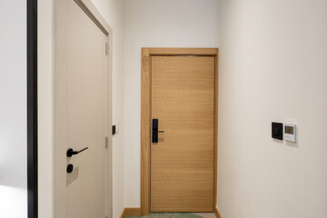 Hotel room corridor with doors