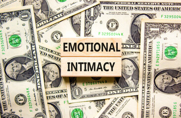 Emotional intimacy symbol. Concept words Emotional intimacy on beautiful wooden blocks. Dollar...