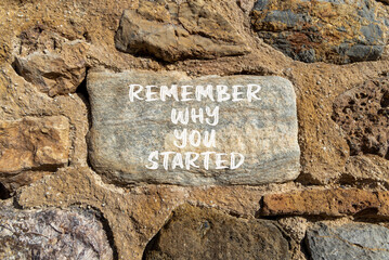 Remember why you started symbol. Concept word Remember why you started on beautiful stone....