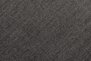 Texture of black carbon fabric. Textile. Background of dark fabric for tailoring - obrazy, fototapety, plakaty