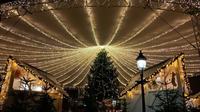  Decorated for Christmas holidays, Denmark, Copenhagen , Viborg, Shopping street in historical center of Aarhus decorated for New Year holidays, Pedestrians Christmas shopping on Stroget at night.