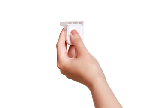 Installing a child-proof magnetic lock to protect cabinet doors and drawers of home furniture, isolated on a white background