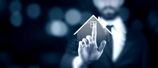 Real estate concept, Businessman showing house icon in hand