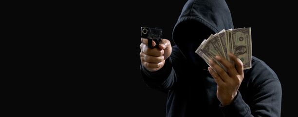 Portrait killer hacker gangster spy man one person in black hoodie standing look hand holding gun...