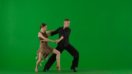 Elegant Ballroom Dance Couple in Action chroma key.