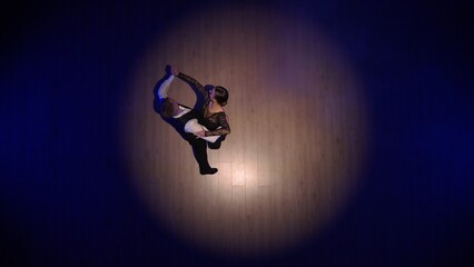 Elegant Ballroom Dance Couple on Spotlight. Top view