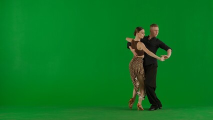 Elegant Ballroom Dance Couple in Action chroma key.