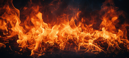 vertical shot of beautiful burning flames at night-