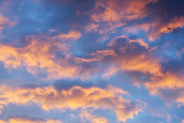 Colorful clouds against blue sky during sunset or sunrise