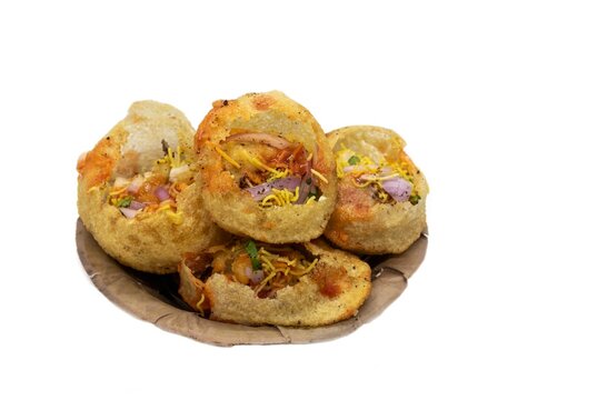 Panipuri or Golgappa in a Dry Leaves Disposable Bowl Isolated on White Background, Also Known as Gupchup, Paani Patashi, Water Pancakes, Gol Gappay, Fuchka, Phuchka, Water Ball