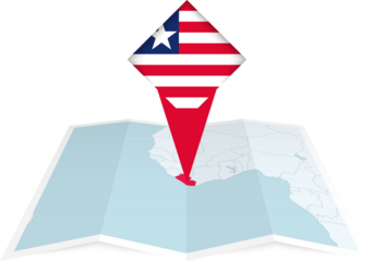 Liberia pin flag and map on a folded map