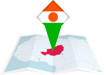 Niger pin flag and map on a folded map