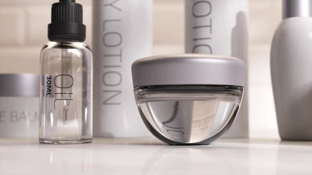 Close-up of skincare bottles in 3D animation, showcasing modern design with clean lines and transparent materials on a reflective surface.
