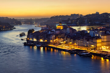 Panoramic view of Douro rive in the city of Porto at sunset, Portugal. 
