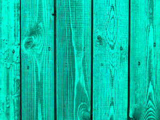 Old plank wooden wall made of boards. Old wooden boards with red nails with peeling paint abstract texture background.