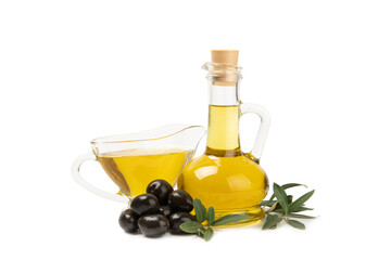 Bottle of fresh olive oil and olives with leaves isolated on white background. Delicious olive oil in a glass bottle. olive oil bottle. Salad dressing. Oil for frying.
