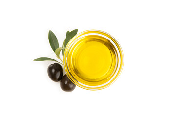 Bowl of fresh olive oil and olives with leaves isolated on white background. Delicious olive oil in...