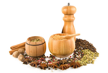 Hand mill and spices set isolated on white. Free space for text.